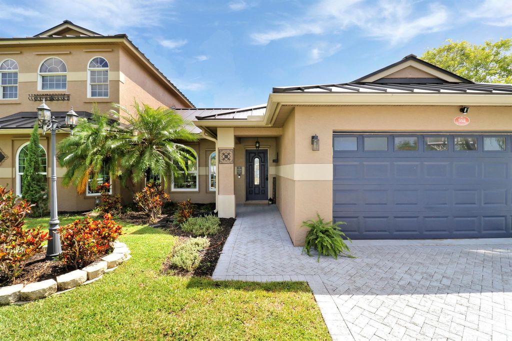 Photo of 552 SW Dauphin Avenue, Port Saint Lucie, FL 34953 (MLS # R11089488)