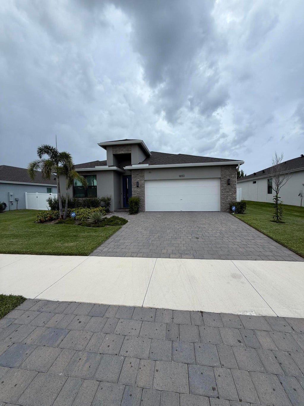 Photo of 1653 NE OCEAN DUNES Drive, Jensen Beach, FL 34957 (MLS # B26060606)