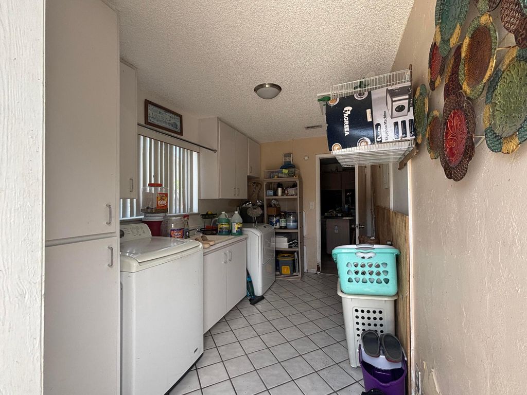 Photo of 4098 Kirkland Lane, Lake Worth, FL 33461 (MLS # R11111121)