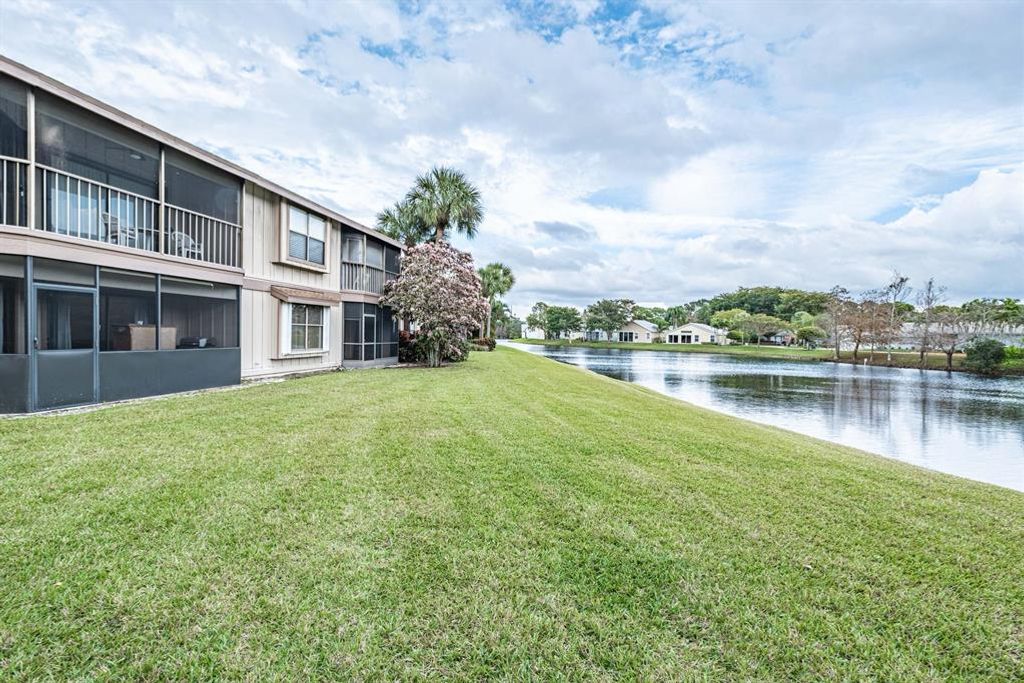 Photo of 300 Crosswinds Drive #F1, Greenacres, FL 33413 (MLS # R10778179)
