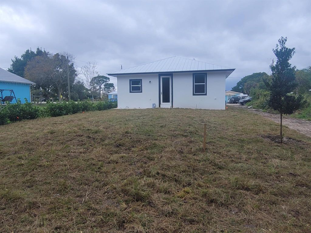 Photo of 5575 SE 47th Avenue, Stuart, FL 34997 (MLS # R10950052)