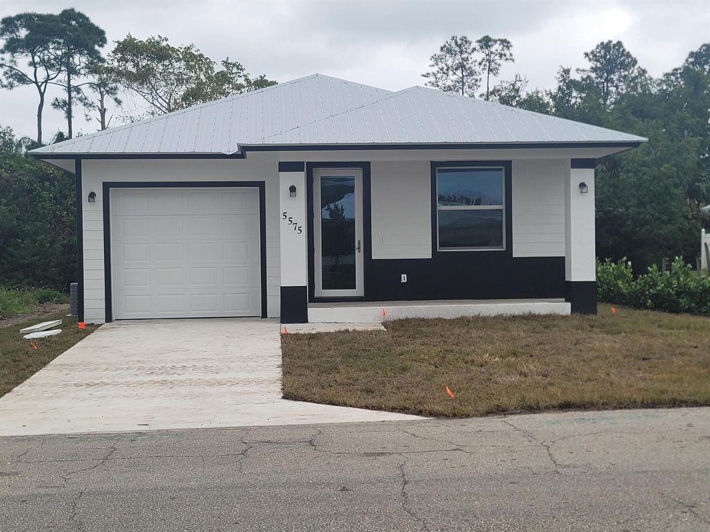 Photo of 5575 SE 47th Avenue, Stuart, FL 34997 (MLS # R10950052)