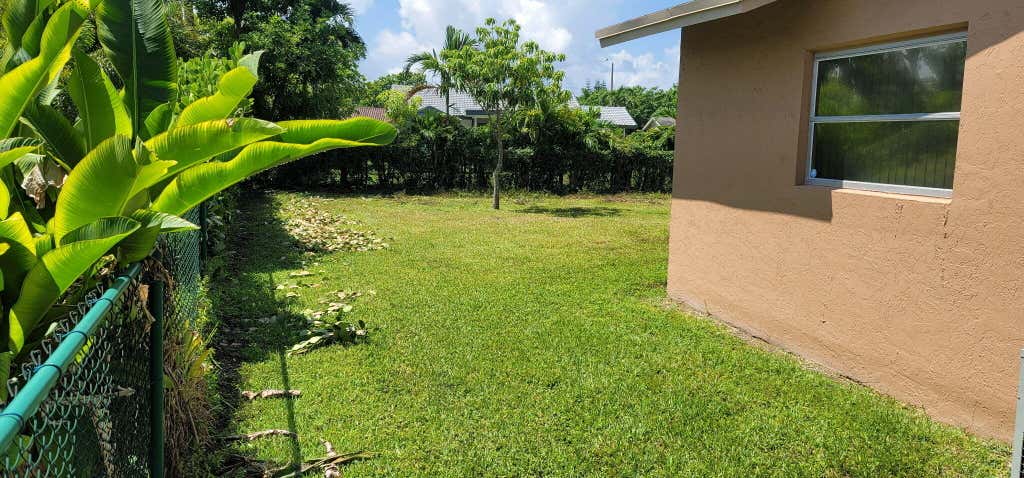 Photo of 9706 NW 71ST Street, Tamarac, FL 33321 (MLS # B26058774)