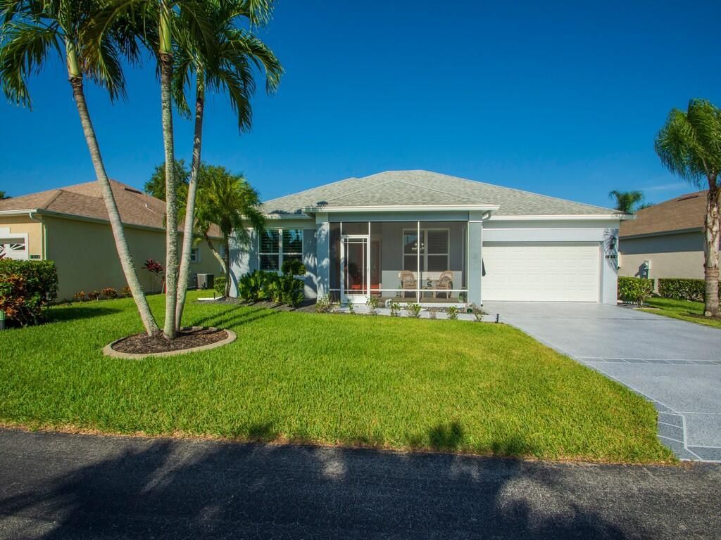 Photo of 1013 NW Tuscany Drive, Saint Lucie West, FL 34986 (MLS # R10740156)