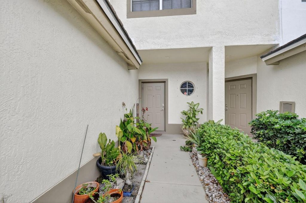 Photo of 7614 Sonesta Shores Drive, Lake Worth, FL 33463 (MLS # R11134278)