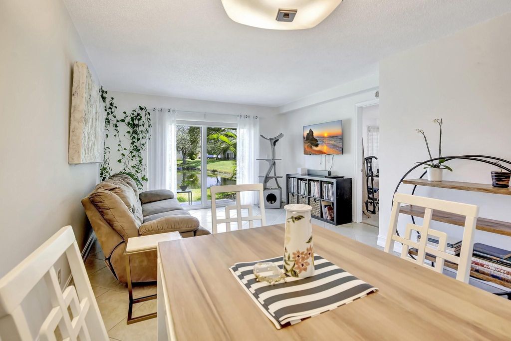 Photo of 9949 Twin Lakes Dr #9-F, Coral Springs, FL 33071 (MLS # F10514934)