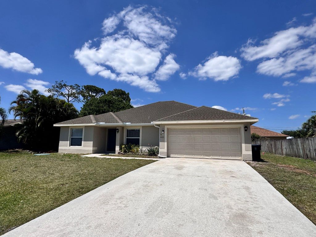 Photo of 1625 SW Bellevue Avenue, Port Saint Lucie, FL 34953 (MLS # R11082615)