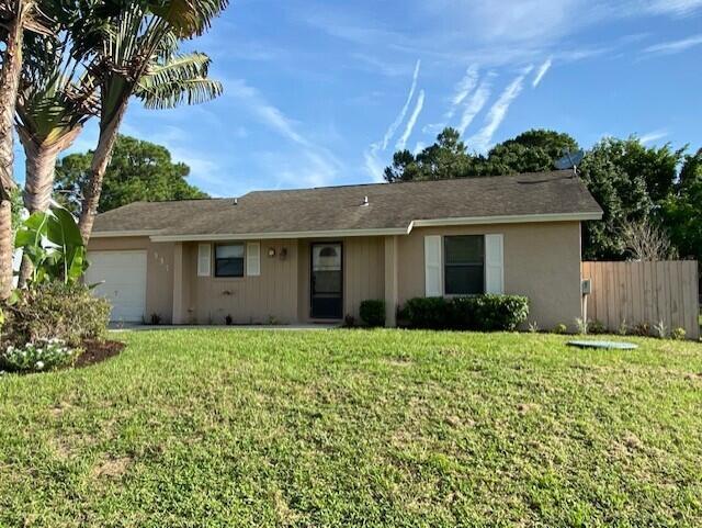 Photo of 557 SW Carter Avenue, Port Saint Lucie, FL 34983 (MLS # R10729854)
