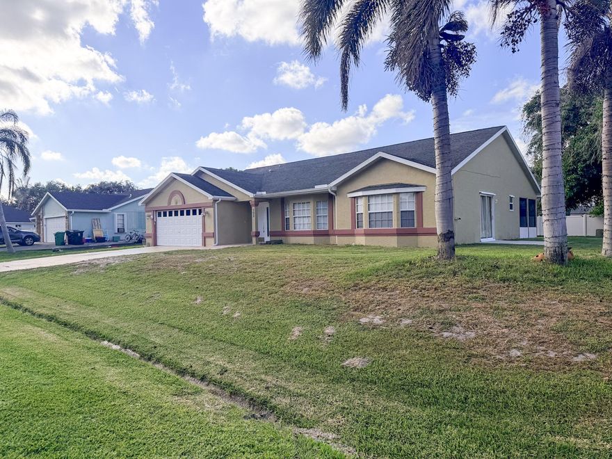 Beautiful and spacious 3 bedroom, 2 bath home with a 2 car garage situated on an oversized lot in a desirable Port St. Lucie neighborhood. Features a split floor plan, generous living areas, and a large backyard perfect for entertaining or future pool. Conveniently located near shopping, dining, schools, I-95, and the Turnpike. No HOA,!  A great opportunity for homeowners or investors. Vacant and easy to show. Please text listing agent for showings.