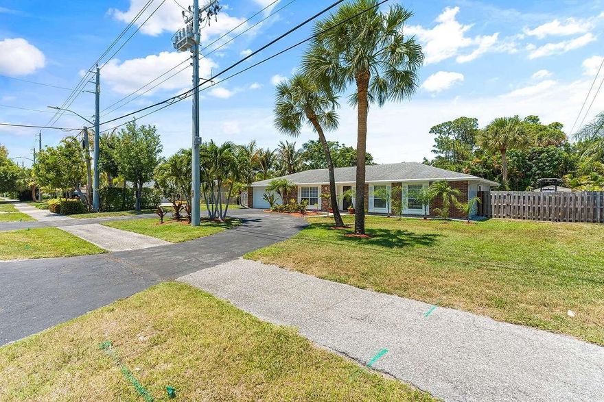 Located in the heart of Jupiter, this beautifully updated 4-bedroom, 2-bath home offers the perfect combination of modern upgrades, outdoor living and unbeatable location with no HOA. The home features a new kitchen, updated bathrooms, new flooring, fresh paint, newer roof and new A/C unit for peace of mind. This spacious layout is filled with natural light and design for comfortable everyday living as well as entertaining. Step outside to your backyard featuring an inground pool with screen enclosure and ample space for your boat. Enjoy the benefits of county property taxes and a prime location just 2 miles from Jupiter's beautiful beaches. Centrally located near popular dining, shopping, golf and entertainment, with convenient access to both I95 and Florida Turnpike for an easy commute.  Move in ready and offering the best of the Jupiter lifestyle without HOA fees or restrictions. Rare opportunity to own a fully updated pool home in one of Palm Beach County's most desirable coastal communities!