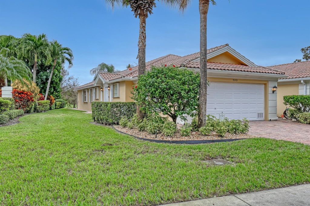 Photo of 5013 Magnolia Bay Circle, Palm Beach Gardens, FL 33418 (MLS # R10943945)