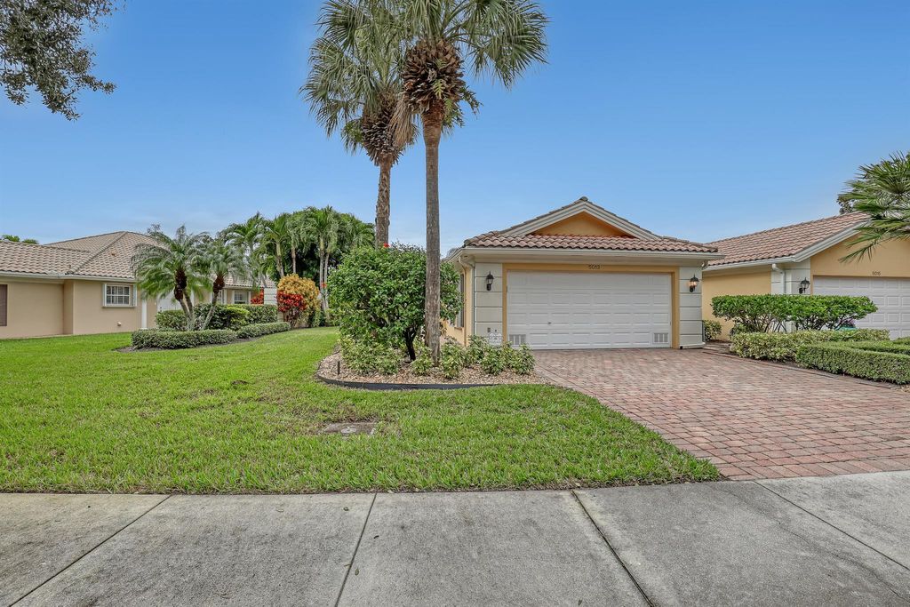 Photo of 5013 Magnolia Bay Circle, Palm Beach Gardens, FL 33418 (MLS # R10943945)