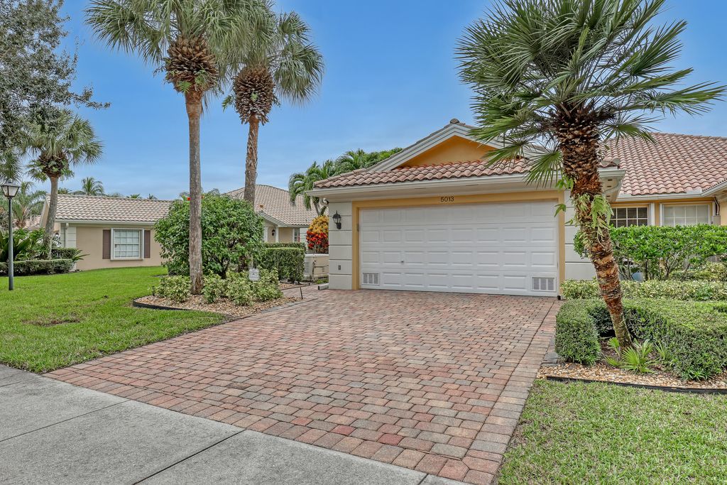 Photo of 5013 Magnolia Bay Circle, Palm Beach Gardens, FL 33418 (MLS # R10943945)