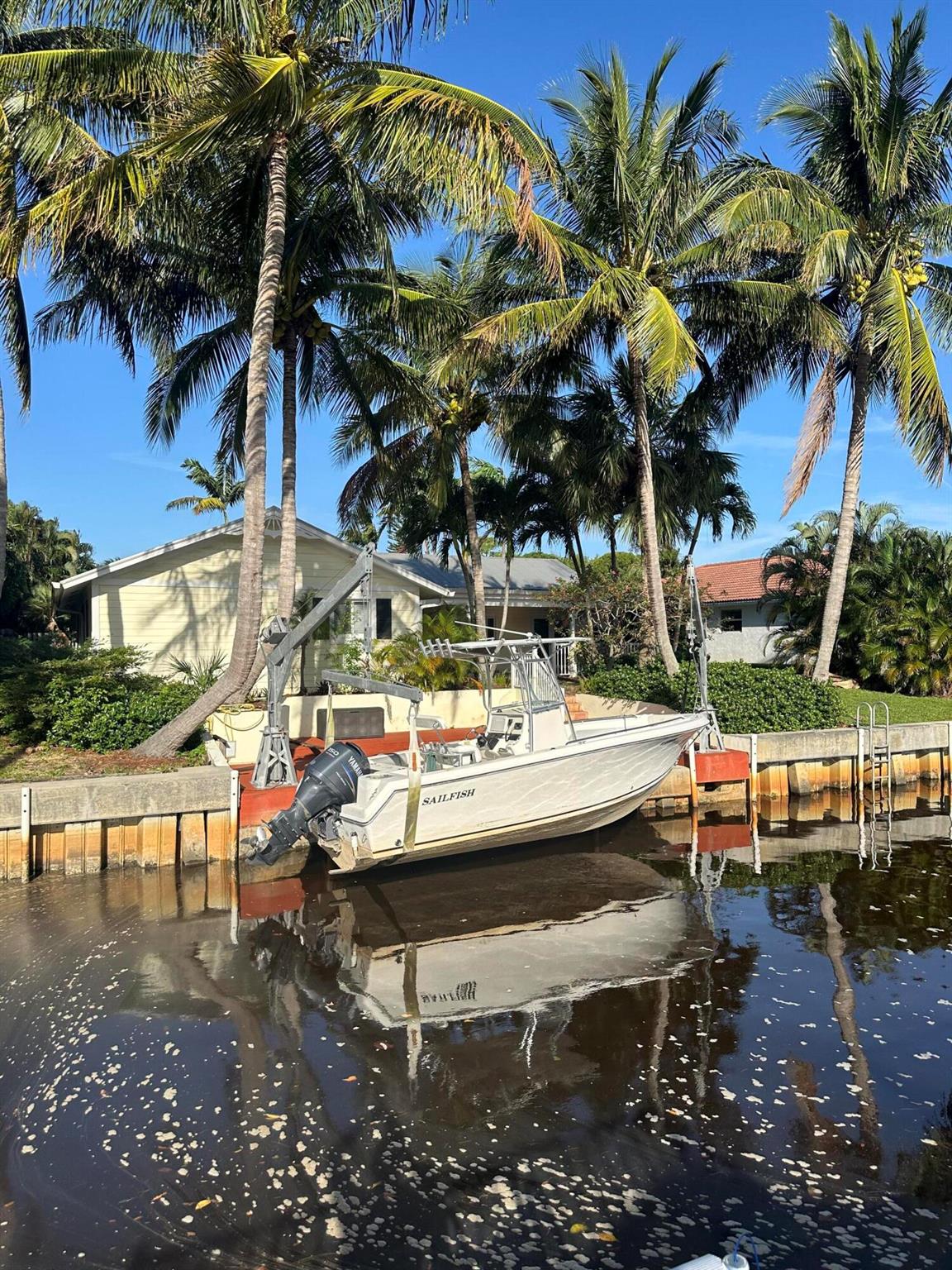 Rarely available single family waterfront rental home. This 3-bedroom ranch home is located on a canal just off the Loxahatchee River in the heart of Jupiter. Park your boat directly behind the home and enjoy the convenience of no fixed-bridge water access to the Jupiter Inlet and Intracoastal Waterway. Charming home with wood flooring, updated kitchen and baths, and split floor plan. CBS construction, metal roof and full hurricane impact glass add peace of mind. Relax and entertain under the large covered patio. Oversized 2-car garage. Davit is equipped to hold approximately 25 foot boat. Inquire with agent regarding lift access.