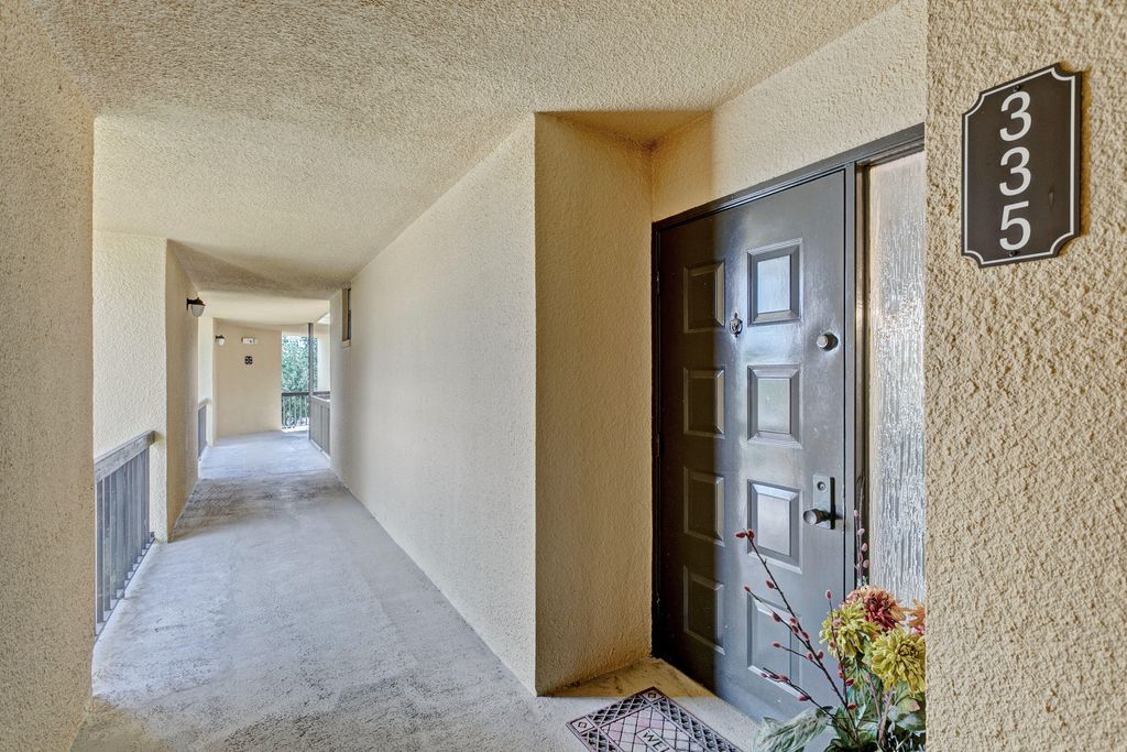 Photo of 5188 Woodland Lakes Drive #335, Palm Beach Gardens, FL 33418 (MLS # R11083067)