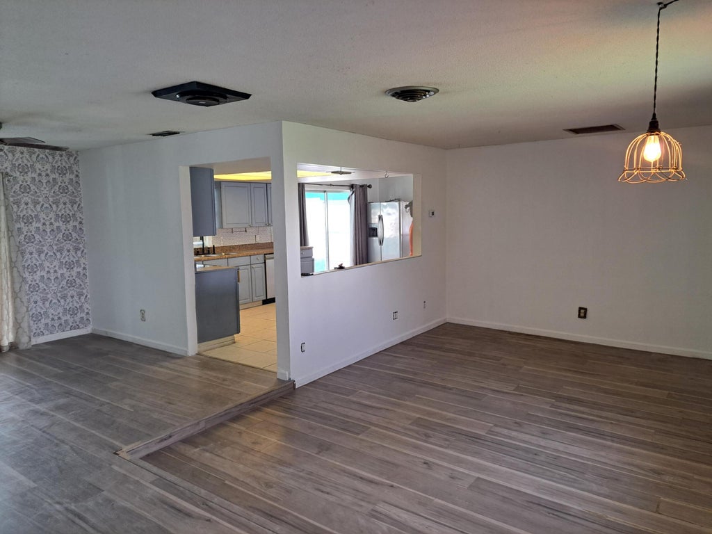 Photo of 115 SE Camino Street, Port Saint Lucie, FL 34952 (MLS # B26069792)