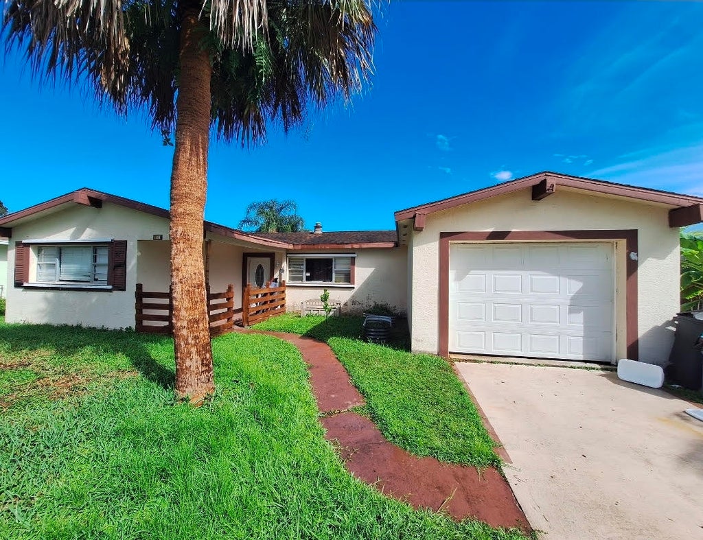 Photo of 115 SE Camino Street, Port Saint Lucie, FL 34952 (MLS # B26069792)