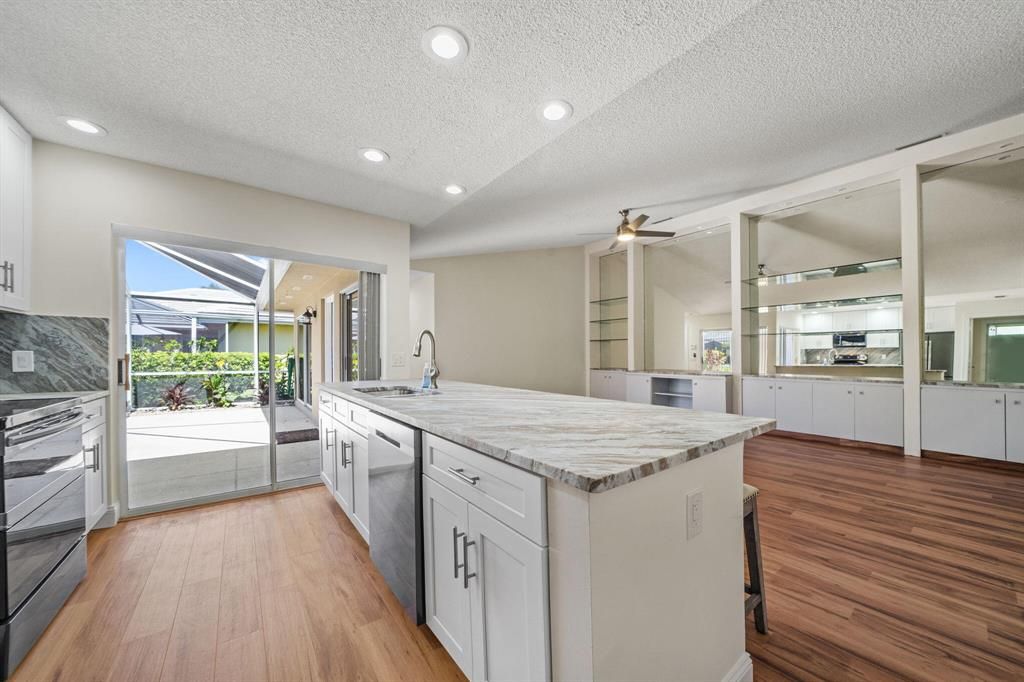 Photo of 3801 Ridgewood Drive, Palm Beach Gardens, FL 33403 (MLS # R10749084)