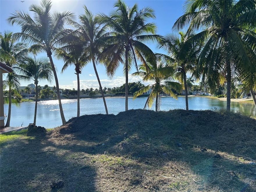 Build your custom home on this lakefront lot in desirable Cutler Bay. Sale comes with architectural plans for aproposed 4-bed, 4-bath single-family home with a 2-car garage, or buyer may choose to design and/or buildtheir own custom home, subject to zoning and permitting. Close to dining, parks & marina. Buyer to verifyzoning /building requirements. Sale includes land & plans only.