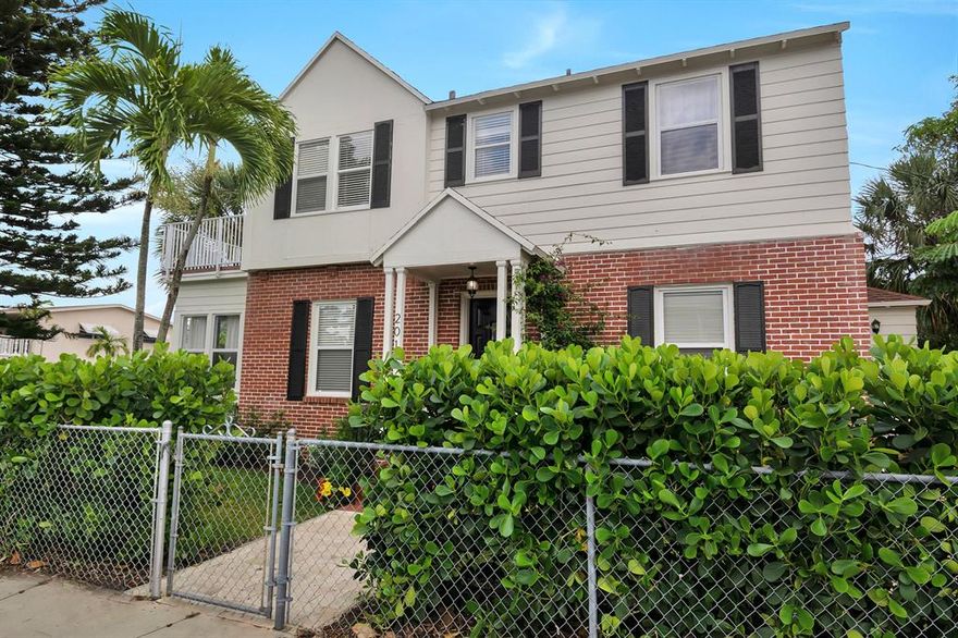 You will absolutely fall in love with this beautiful, classic home only 2 blocks to Downtown Lake Worth Beach. As you walk through the front door you will notice the tall ceilings, beautiful wood floors and riser stairs that lead to 3 nice size bedrooms. Amazing home to entertain with an updated kitchen and stainless appliances and plenty of natural light. This home has 2 new central A/C systems, plenty of updates, a master bedroom with claw foot tub and balcony overlooking the fenced yard and star viewing at night. Walk to Downtown, the Beach and more. Tons of charm and more. Come take a look.