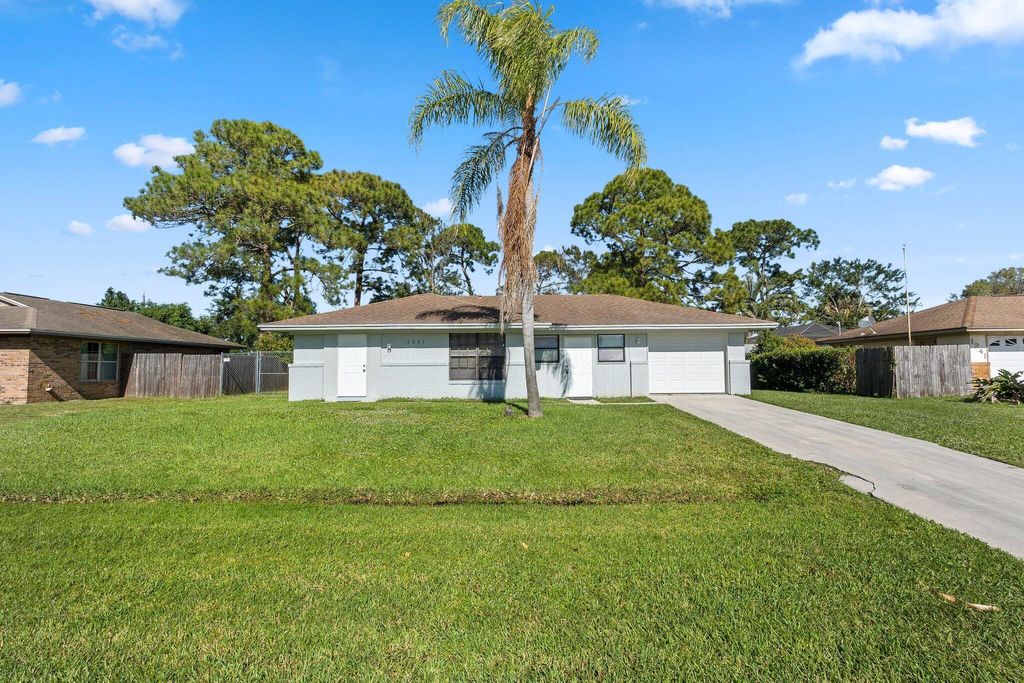 Photo of 1251 SW Sudder Avenue, Port Saint Lucie, FL 34953 (MLS # R10982716)