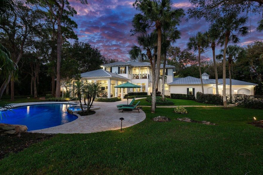 This property at 16356 Bridlewood in Delray's esteemed Fox Chase community truly exemplifies luxury living. With only 43 estate homes, this exclusive neighborhood is celebrated for its spacious and rare lot sizes, ensuring both privacy and unmatched grandeur.The home itself boasts timeless architectural design by KAUFMAN-LYNN.    Custom, high-quality finishes from towering solid core doors to high ceilings and intricate custom cabinetry and woodworking, every detail speaks of elegance. The wide plank hardwood flooring throughout adds warmth, creating an inviting atmosphere perfect for entertaining guests or enjoying quiet family moments.Set on over an acre, the generous setback enhances the home's stately presence, featuring a large auto court and a