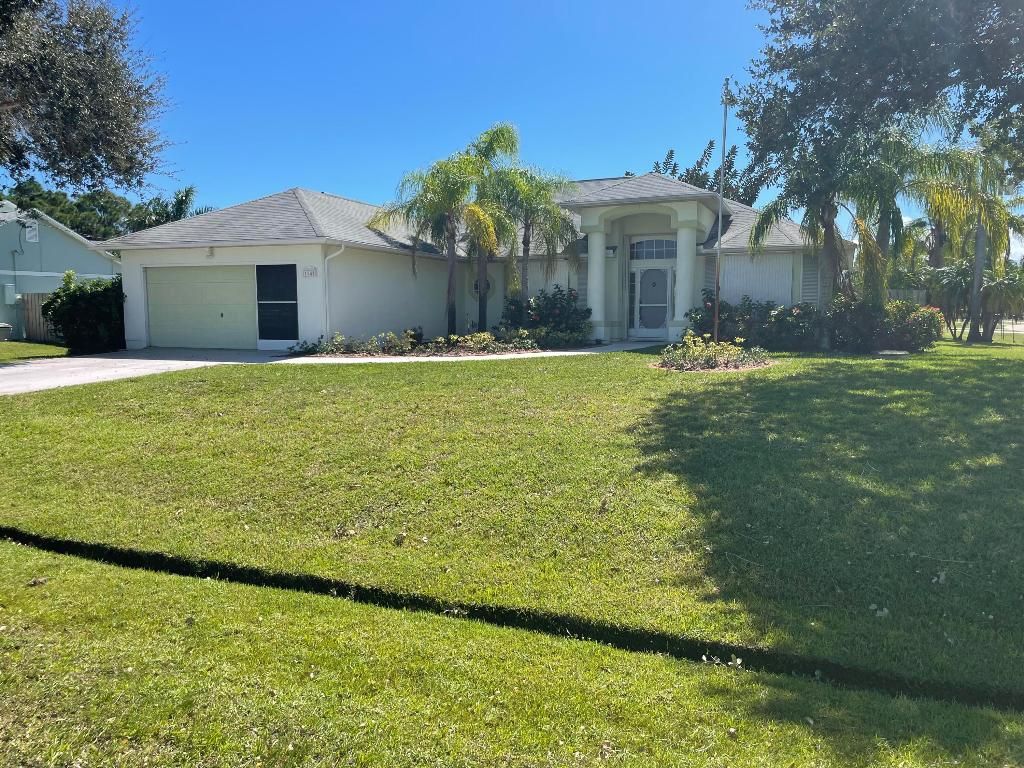 Photo of 1544 SE North Blackwell Drive, Port Saint Lucie, FL 34952 (MLS # R10958452)