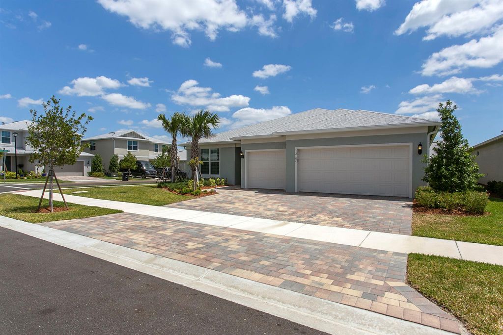 Photo of 12187 SW Myrtle Oak Drive, Port Saint Lucie, FL 34987 (MLS # R11082997)