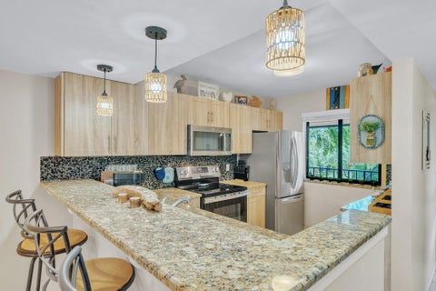 Tiny photo for 4833 Esedra Court #305, Lake Worth, FL 33467 (MLS # B26087123)