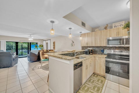 Photo of 4833 Esedra Court #305, Lake Worth, FL 33467 (MLS # B26087123)