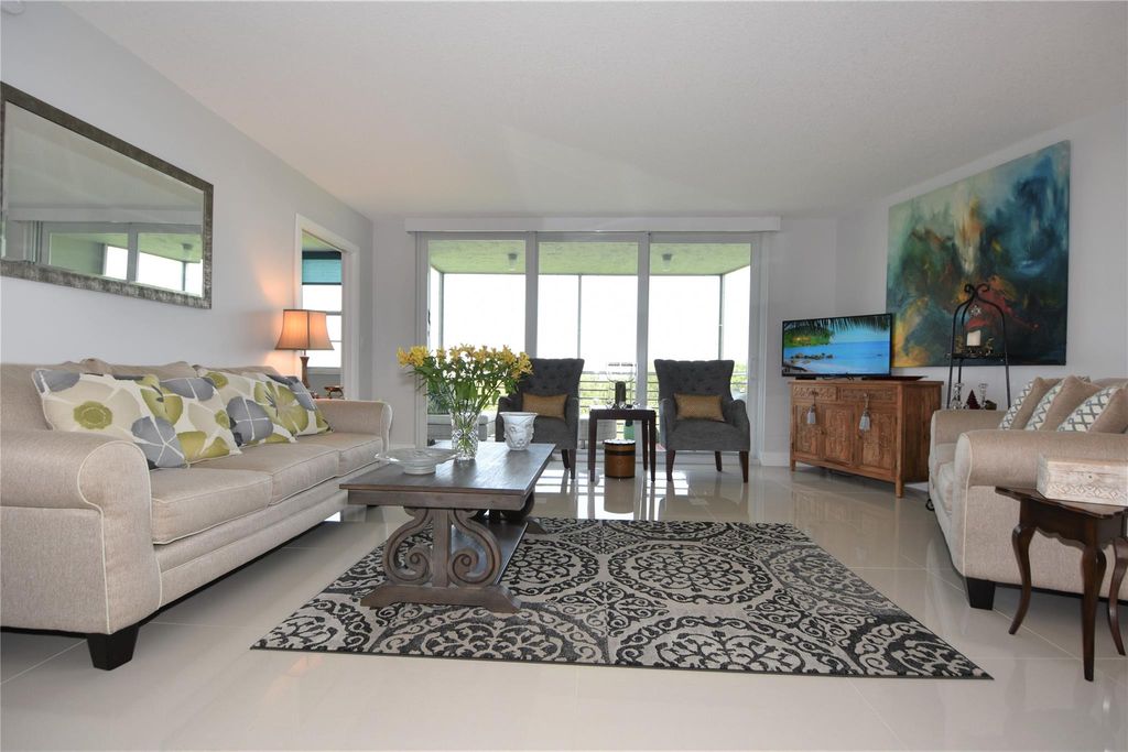 Photo of 625 Oaks Dr #705, Pompano Beach, FL 33069 (MLS # F10391986)