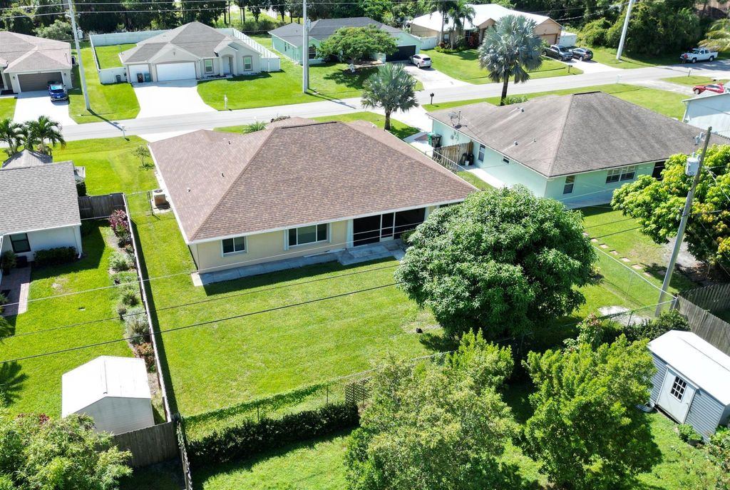 Photo of 1249 SW Hunnicut Avenue, Port Saint Lucie, FL 34953 (MLS # R10917276)