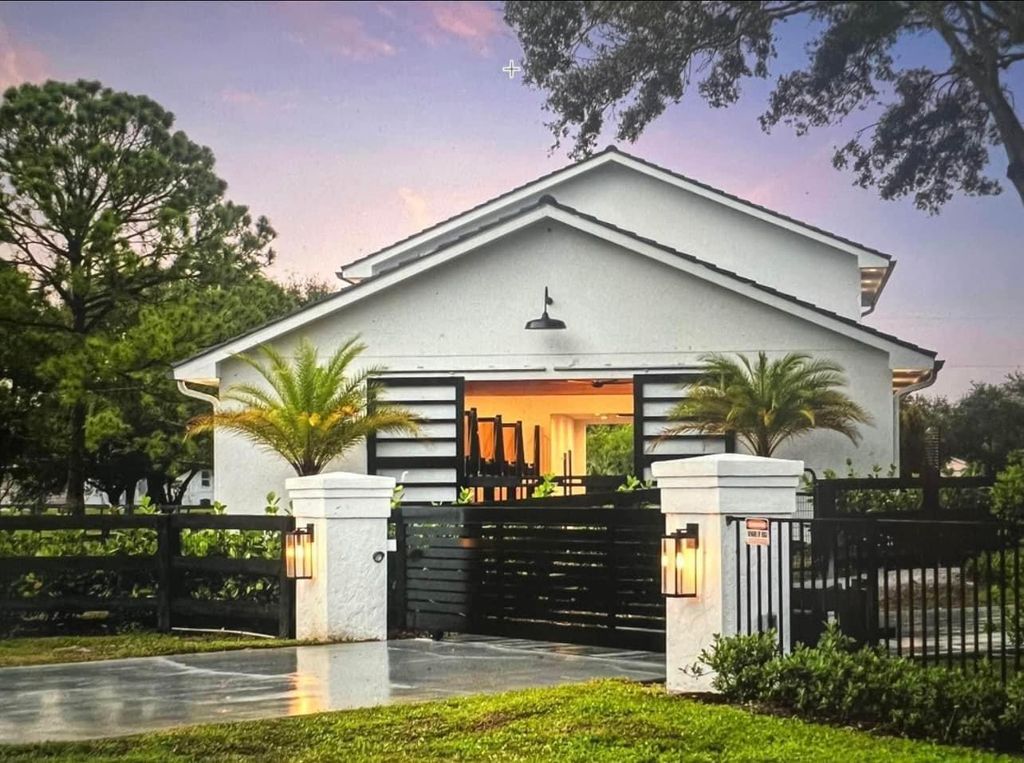 Photo of 14322 Drafthorse Lane #Stalls, Wellington, FL 33414 (MLS # B26011870)