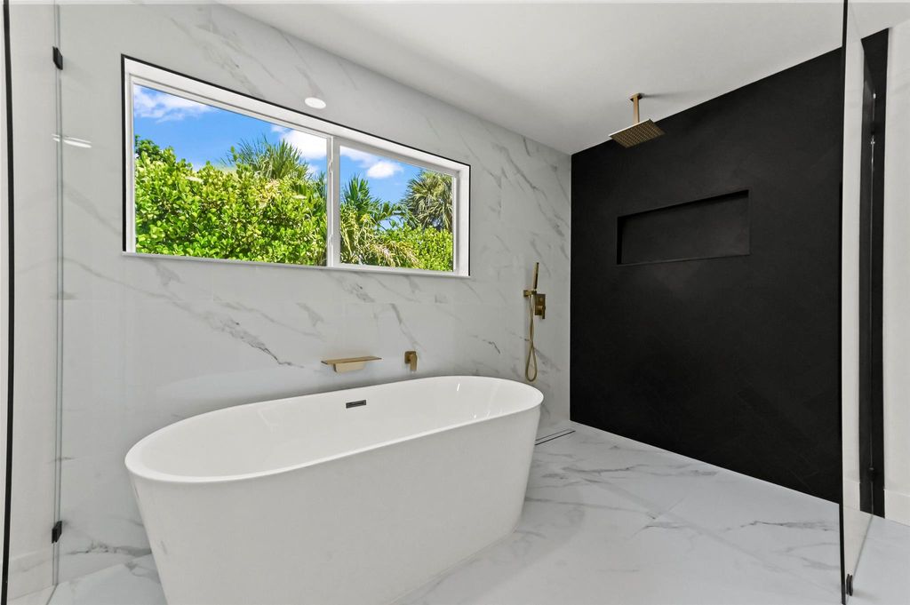 Photo of 435 Park Avenue, Lake Park, FL 33403 (MLS # R11114062)