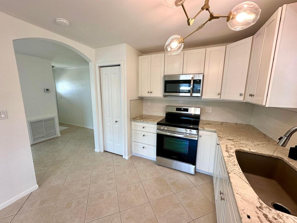 Photo of 9372 Birmingham Drive, Palm Beach Gardens, FL 33410 (MLS # R11015962)
