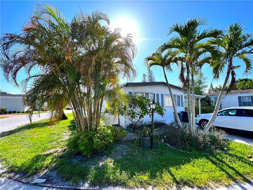 No Age Restrictions @ Lake Worth Village!  This oversized manufactured home is in top condition.  Corner Lot - centrally located to EVERYTHING - oversized 1600+ sq ft home features a 3 bedroom, 2 full bath, living room, dining room, and kitchen with upgraded cabinets. A large covered front porch, a 300 sq ft shed for storage and laundry - come make this spacious home yours!  Lot lease $953/mo includes lot rent and HOA amenities like water, a renovated fitness center, two mini soccer fields, basketball courts, playground, swimming pools, and clubhouse for gatherings and much more!  Annual maintenance on roof, regularly services A/C, updated hot water heater, GE Electrical Panel.  This home comes fully furnished, Unfurnished sale is okay. Call now for a private tour.