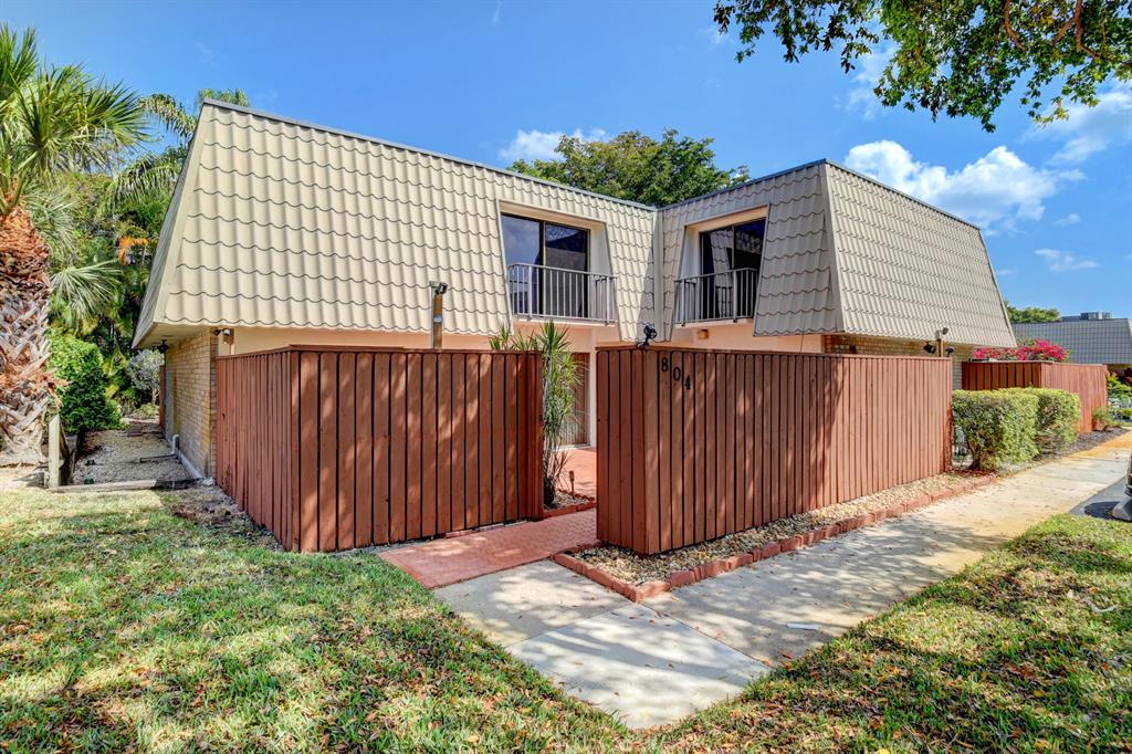 Nice clean unit, ready to move in. Lots of space. OPEN floor plan with Kitchen opened to living area. One bedroom with closet downstairs, 2 upstairs and 2 full baths, 1/2 bath downstairs.. with full size washer and dryer. Great location in community Pool right next door. Lovely fenced in patio.. Centrally located in West Palm close to Out-let mall and downtown, easy access to 95 or east to the beaches..