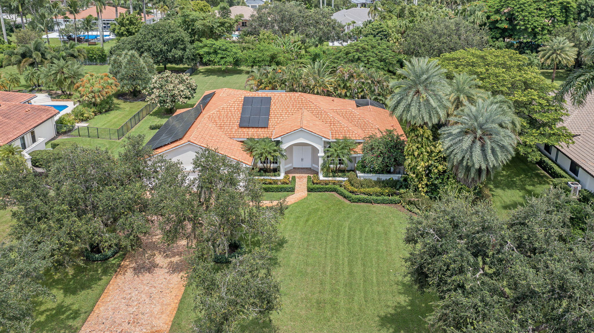 Welcome to 10345 SW 23rd Ct in Davie's exclusive Westridge community. This 3-bed, 3-bath home sits on a spacious 0.81-acre lot, offering a newer roof, solar panels, and endless potential to customize. Enjoy the tranquility of Westridge, known for its privacy, lush landscaping, and beautiful estates. Minutes from top-rated schools, shopping, dining, and major highways. Don't miss this chance to create your dream home--schedule your private tour today!