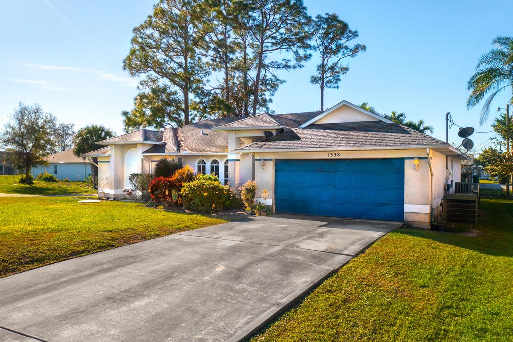 Photo of 1338 SW Prairie Circle, Port Saint Lucie, FL 34953 (MLS # R10952448)