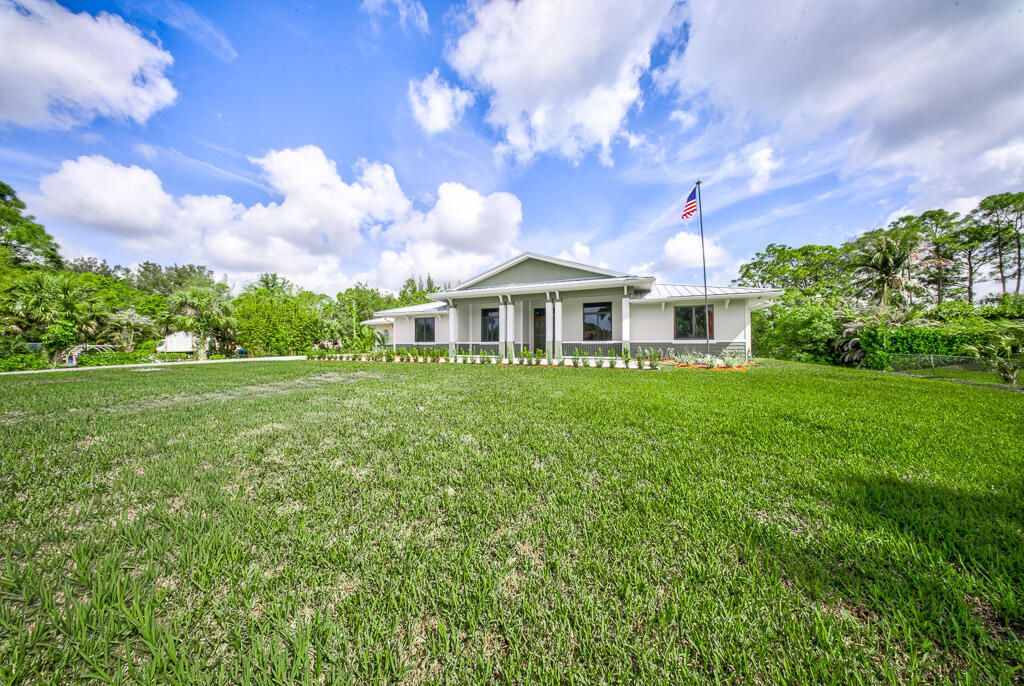 Photo of 11165 Tangerine Boulevard, West Palm Beach, FL 33412 (MLS # B26014426)