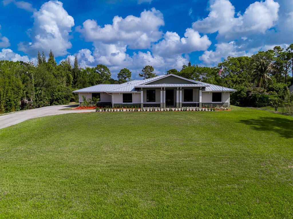 Photo of 11165 Tangerine Boulevard, West Palm Beach, FL 33412 (MLS # B26014426)