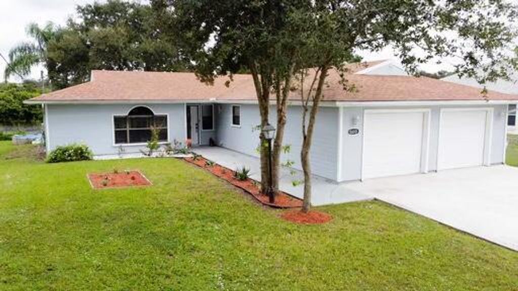 Photo of 5610 Fort Pierce Boulevard Blvd, Fort Pierce, FL 34951 (MLS # R10753513)