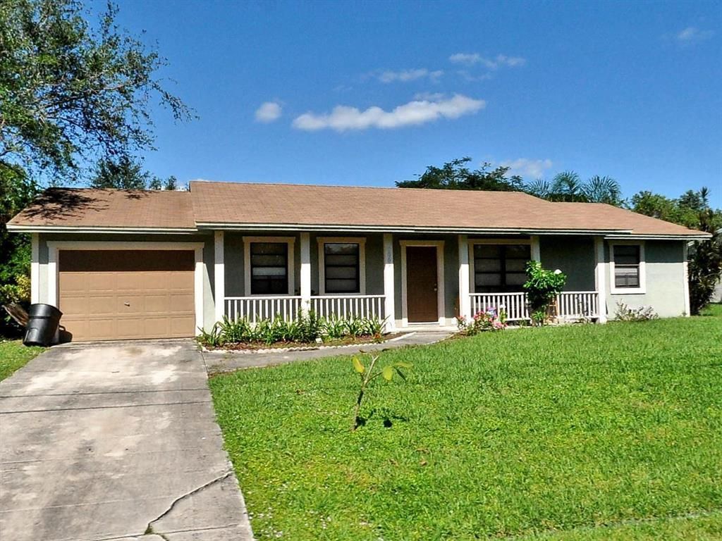 Photo of 1369 SW Gastador Avenue Ave, Port St Lucie, FL 34953 (MLS # R10759035)