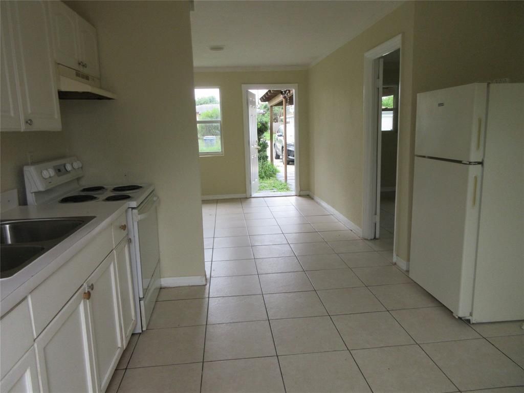 Photo of 1548 W 10th Street, Riviera Beach, FL 33404 (MLS # R11013498)