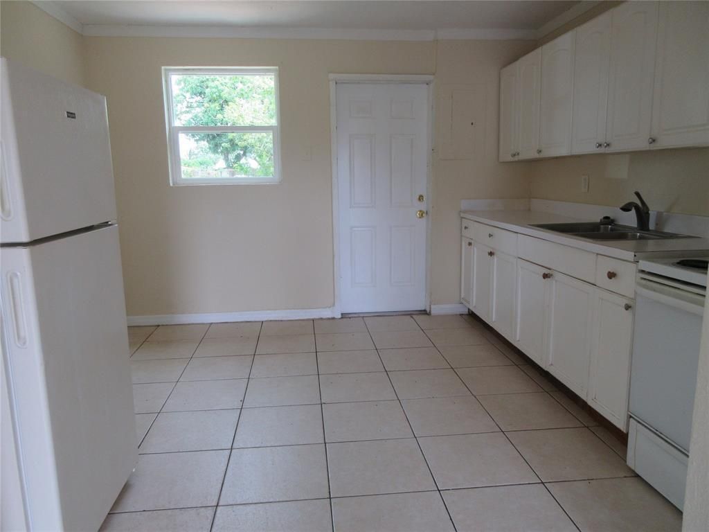 Photo of 1548 W 10th Street, Riviera Beach, FL 33404 (MLS # R11013498)