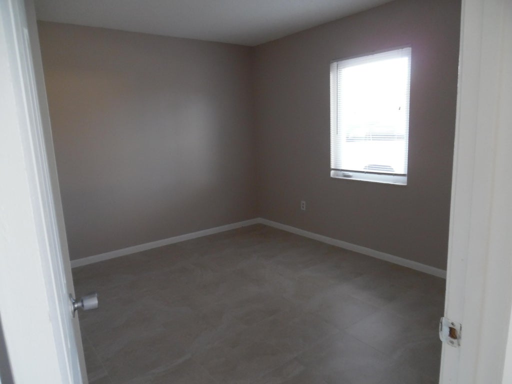 Photo of 3986 Hernden Drive, Lake Worth, FL 33461 (MLS # B26081416)