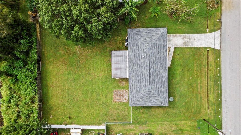 Photo of 393 NW Curtis Street, Port Saint Lucie, FL 34983 (MLS # R11126435)