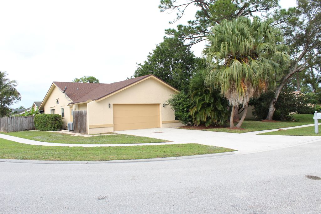 Photo of 147 Parkwood Drive, Royal Palm Beach, FL 33411 (MLS # R10945033)