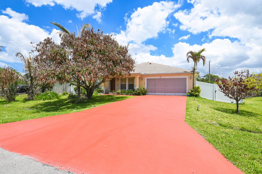 Beautiful 4-bedroom, 2-bath home nestled on a quiet street in the heart of Port St. Lucie! This well-maintained property features spacious, open living areas perfect for both everyday living and entertaining. The kitchen offers modern appliances and ample cabinetry. The large backyard provides plenty of room to add a pool or create your ideal outdoor retreat. Home is equipped with solar panels for energy efficiency, a sprinkler system, a water softener, security cameras throughout, and accordion shutters for storm protection. Conveniently located just minutes from I-95 and the Florida Turnpike, with shopping, dining, schools, and parks nearby.