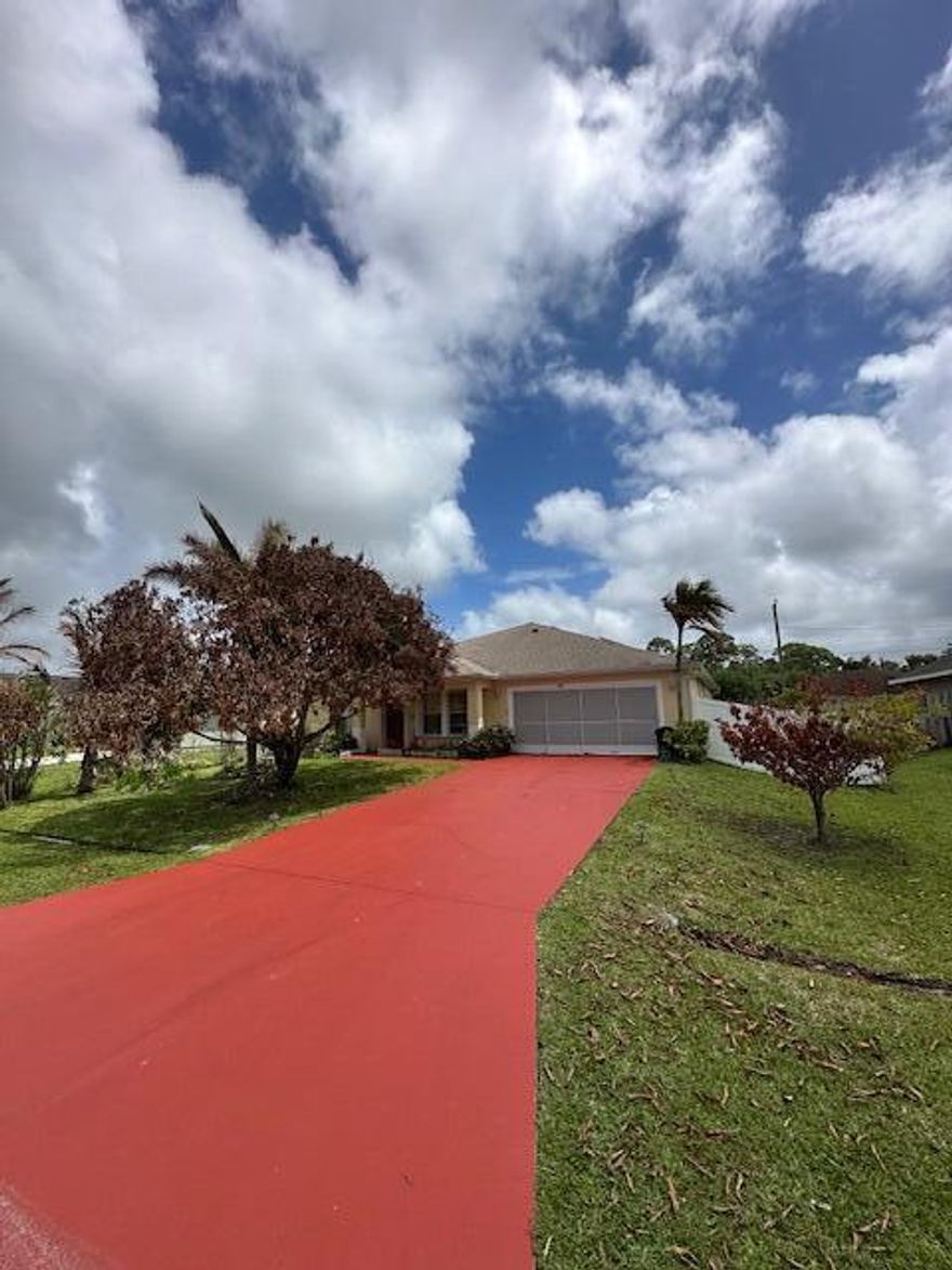 Beautiful 4-bedroom, 2-bath home nestled on a quiet street in the heart of Port St. Lucie! This well-maintained property features spacious, open living areas perfect for both everyday living and entertaining. The kitchen offers modern appliances and ample cabinetry. The large backyard provides plenty of room to add a pool or create your ideal outdoor retreat. Home is equipped with solar panels for energy efficiency, a sprinkler system, a water softener, security cameras throughout, and accordion shutters for storm protection. Conveniently located just minutes from I-95 and the Florida Turnpike, with shopping, dining, schools, and parks nearby. PHOTOS COMING SOON!